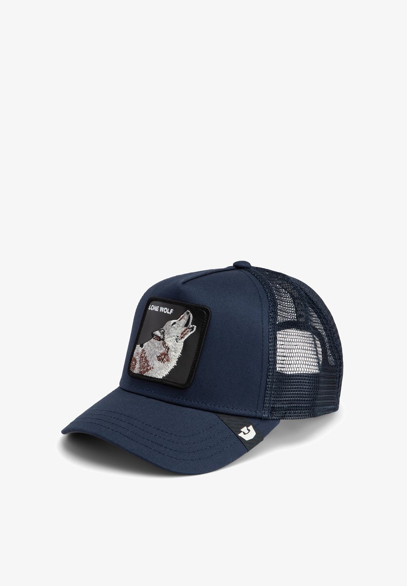 Casquette trucker en maille bleue avec un panneau avant solide arborant un patch brodé de loup et le texte "LONE WOLF" au-dessus. Fermeture snapback réglable.
