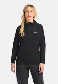 Zwarte lange mouwen pullover met halve rits, gemaakt van lichtgewicht stof, met een logo op de borst en aansluitende manchetten.