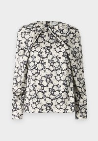 Schwarze Blumenbluse mit cremefarbenen Blumen, langen Ärmeln, gefältelten Details an den Schultern und geradem Saum. Weicher Stoff.