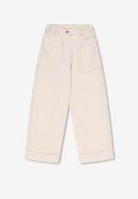 Pantalons larges beige en denim, avec de grandes poches avant, des coutures visibles et des poignets retroussés pour un design décontracté.