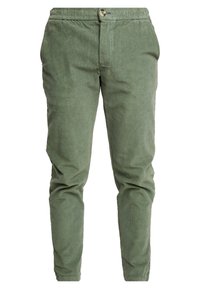 Groene corduroybroek met een taps toelopende pasvorm, voorzien van een elastische tailleband, knoopsluiting en twee voorkesten.