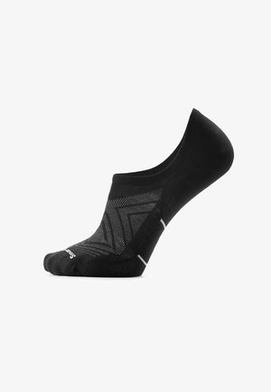 Chaussette noire invisible avec motif géométrique et accents blancs subtils, présentée sur un fond blanc en vue de profil latéral.