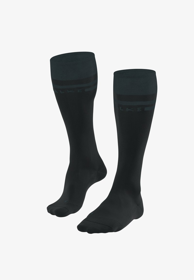 Calzini neri alti fino al ginocchio realizzati in un tessuto liscio, con un logo discreto vicino alla parte superiore e un design a costine per una maggiore texture.