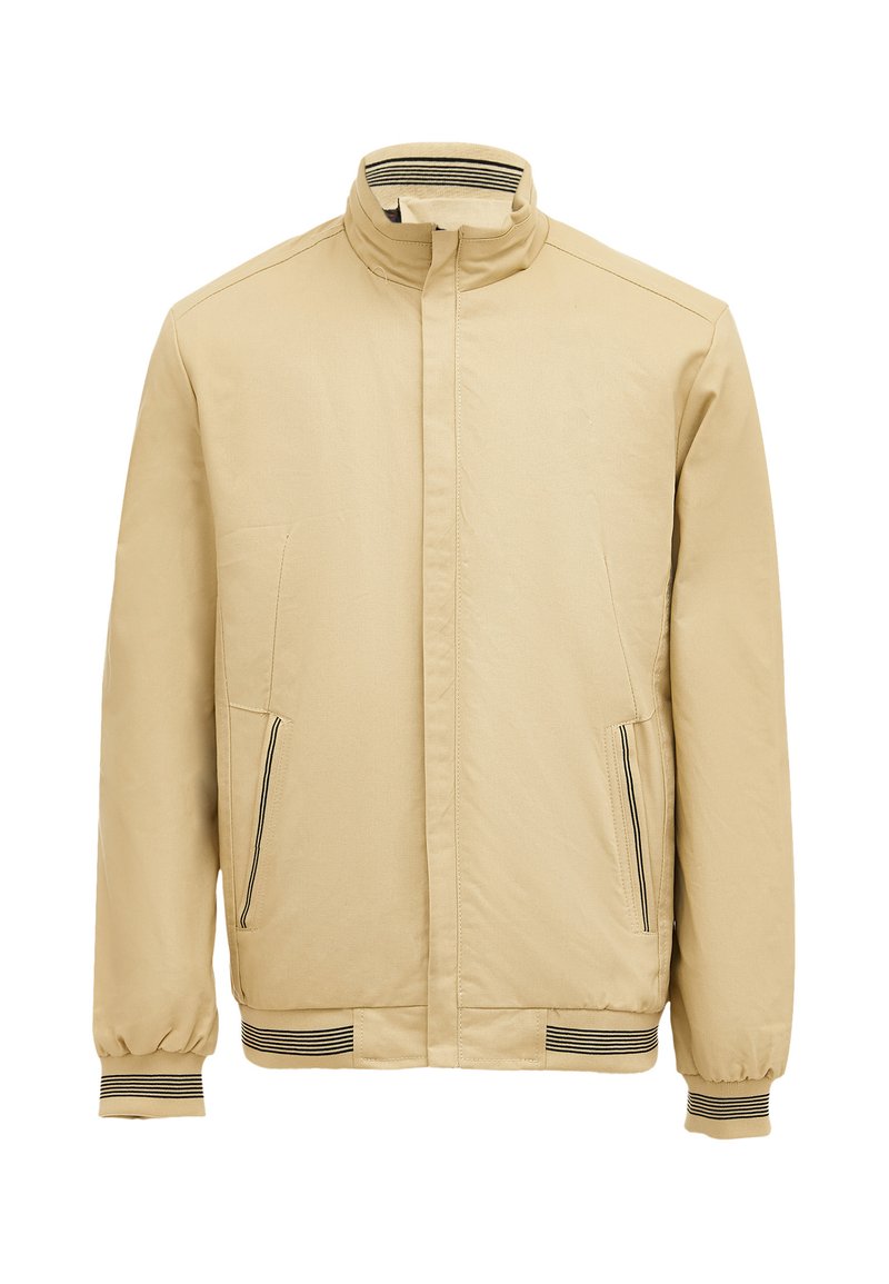 Beige jakke lavet af glat stof, med krave, sidelommer med sorte detaljer og stribede ribkantede ærmer og bund.