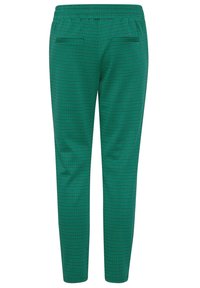 Zielone spodnie w wzory z teksturą, z bocznymi kieszeniami i elastycznym paskiem w talii dla wygody.