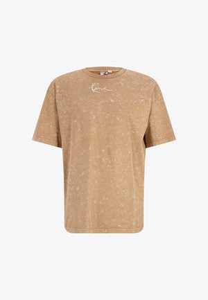 Tricou cu mânecă scurtă într-o nuanță deschisă de bej, realizat dintr-un material moale, având o textură ușor stropită și un logo alb pe piept.