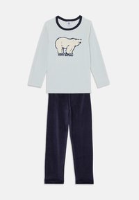 Light blue long-sleeve top featuring a bear graphic and "Petit Bateau" text, paired with soft navy blue pants. Both made of comfortable fabric.