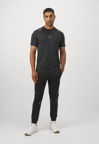 Ellesse UNASTAN PANT - Træningsbukser - black