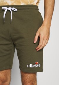 Ellesse SILVAN - Calças de fato de treino - khaki