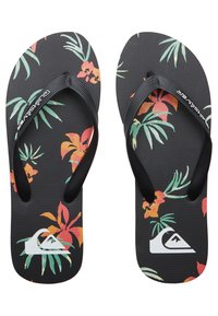Mustat flip-flopit, joissa on teksturoitu pohja, ja värikäs kukkakuosi punaisena, oranssina ja vihreänä, mustat kumiset hihnat. Logo sivussa.