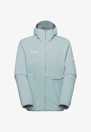 Lyseblå hættetrøje med lynlås foran, brystlomme på venstre side, elastiske manchetter og "MAMMUT"-logo på brystet og ærmet.