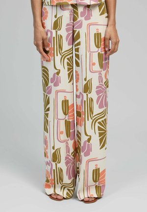 Pantalons larges en tissu crème présentant un motif floral et géométrique multicolore dans les tons rose, orange et vert. Texture lisse, longueur cheville.
