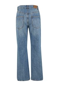 Light blue denim flared jeans with a high waist, featuring two back pockets and a leather patch at the waistband.