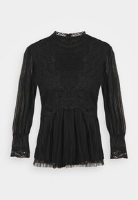 Maglietta nera a maniche lunghe con dettagli in pizzo, colletto alto e tessuto plissettato. Presenta un intricato bordo in pizzo ai polsini e al busto.