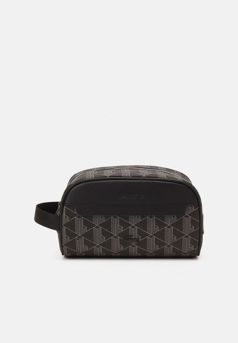 Bolsa de toalete preta com um design de padrão geométrico, feita de material durável com uma textura suave e uma pega resistente.