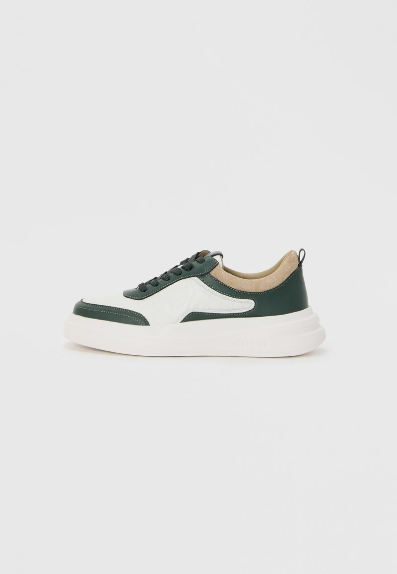 Green and white sneaker with a textured design, round toe, lace-up front, beige accents, and a thick white sole. Features a pull tab at the back.