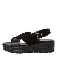 Sandalo nero con tomaia in suede e cinturino regolabile sul retro. Presenta una suola con plateau confortevole e un leggero tacco.