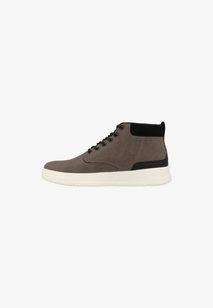 Gray suede high-top sneaker featuring a white sole, black accent on the heel, and black laces. Simple, streamlined design with stitching details.