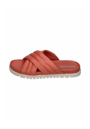 Coral slide sandal with woven straps, rubber sole, and white tread. Features a flat heel and cushioned footbed for comfort.