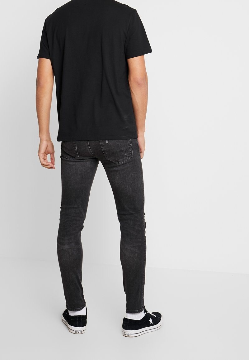 Jean Homme American Eagle Slim Droit - Taille 31/32, Noir - Occasion Très Bon état