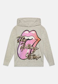 Svijetlo siva dukserica sa velikim, šarenim grafičkim prikazom usana u nijansama roze i narandžaste, uz sjajni, zlatni natpis "The Rolling Stones."