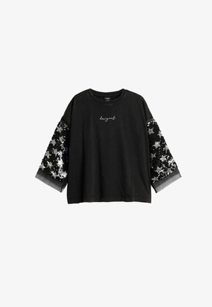 Schwarzes Baumwollhemd mit weiten Ärmeln, verziert mit silbernen und schwarzen Pailletten an den Ärmeln und dem auf der Vorderseite gestickten Schriftzug "designual".