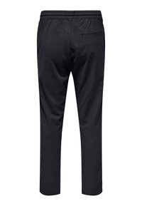 Schwarze, dehnbare Hosen mit einem elastischen Bund, geradem Bein und einer einzigen Gesäßtasche. Glattes Material mit minimaler Ausstattung.