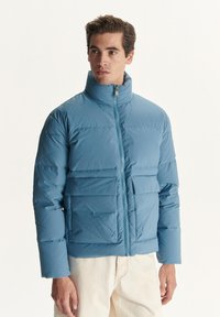 Seleccionado, bleu