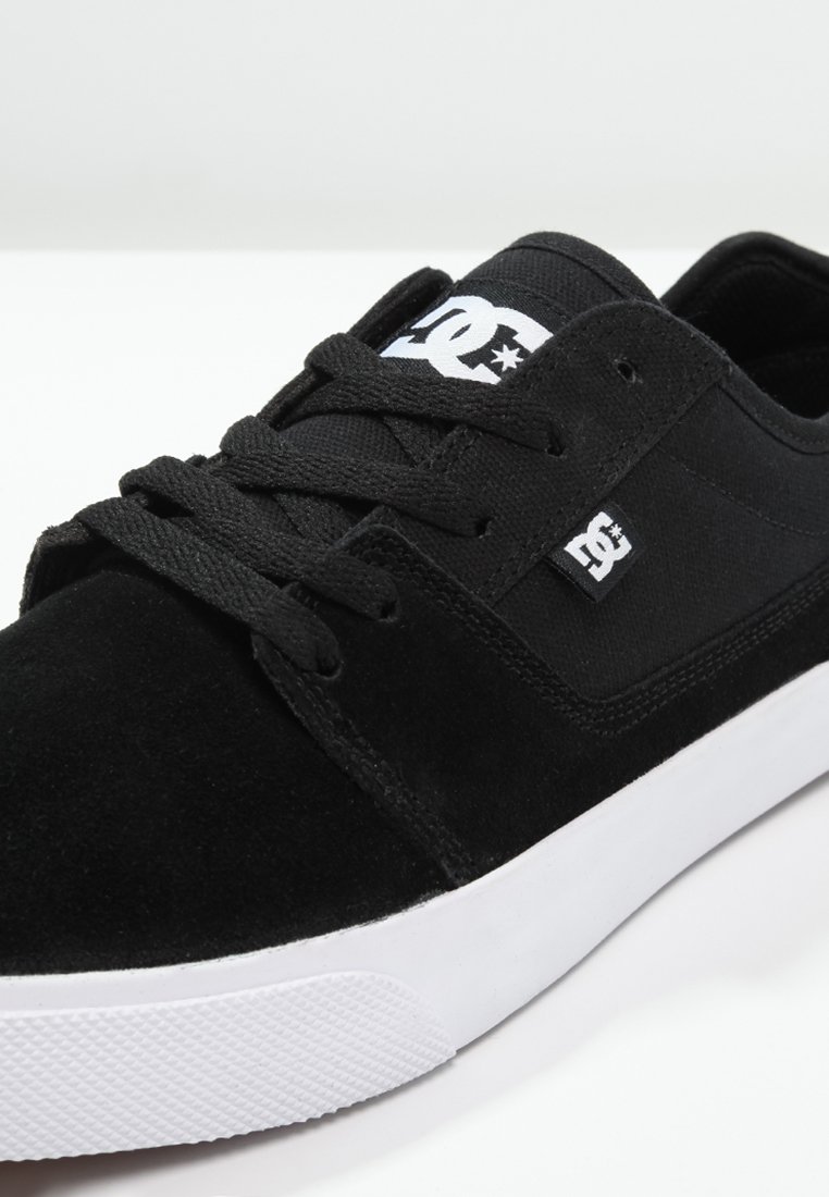 black and white dc shoes