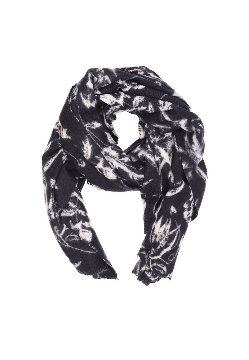 Sciarpa con motivo floreale in bianco e nero, texture morbida, forma rettangolare, bordi frangiati, drappeggiata in modo rilassato.