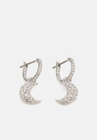 Boucles d'oreilles en argent avec des pendentifs en forme de croissant, ornées de gemmes transparents pour l'éclat et le détail.