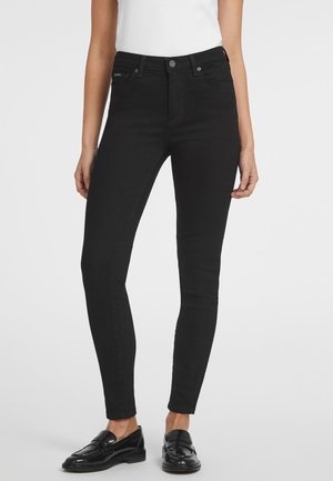 Black high-waisted skinny jeans made of denim, featuring a five-pocket design, a metal button closure, and a sleek, fitted silhouette.