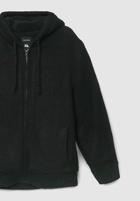 Felpa con zip nera in tessuto lavorato, dotata di cappuccio, tasche laterali e polsini e orlo a coste. Taglia XL.