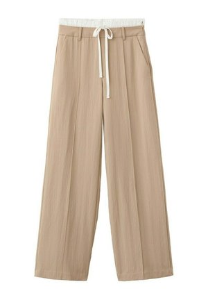Pantalon beige à jambes larges avec une ceinture élastique blanche et un cordon de serrage, équipé de poches latérales et de passants pour ceinture.