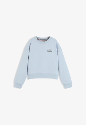 Lyseblå Tommy Hilfiger sweatshirt med lange ærmer og ribkanter ved ærmerne, med et lille logo på venstre bryst.