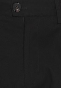Black fabric pants with a smooth texture, featuring a button closure and a zip fly. Includes front pocket stitching detail.