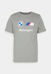 Šedé bavlněné tričko s krátkými rukávy, s logy BMW a M a nápisem "Motorsport" vytištěným bílou barvou. Kolo výstřih s černými akcenty.