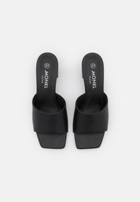 Monki Mules à talons - black
