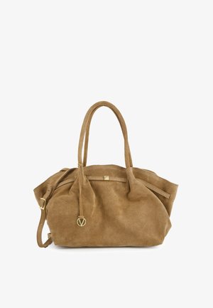 Sac à main en suède marron avec deux anses, fermeture à cordon et un accent doré. Texture douce et design simple.