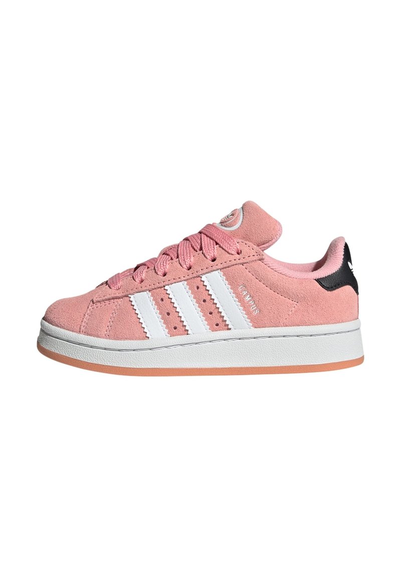 Pink suede sneakers with white three-stripe design, rounded toe, pink laces, and rubber sole with orange accents at the bottom.