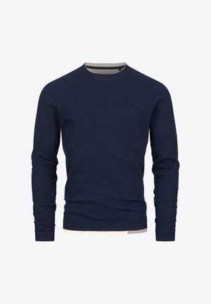 Marineblauw T-shirt met lange mouwen in geribbelde textuur met een ronde hals en een lichtkleurige afwerking bij de kraag en zoom.