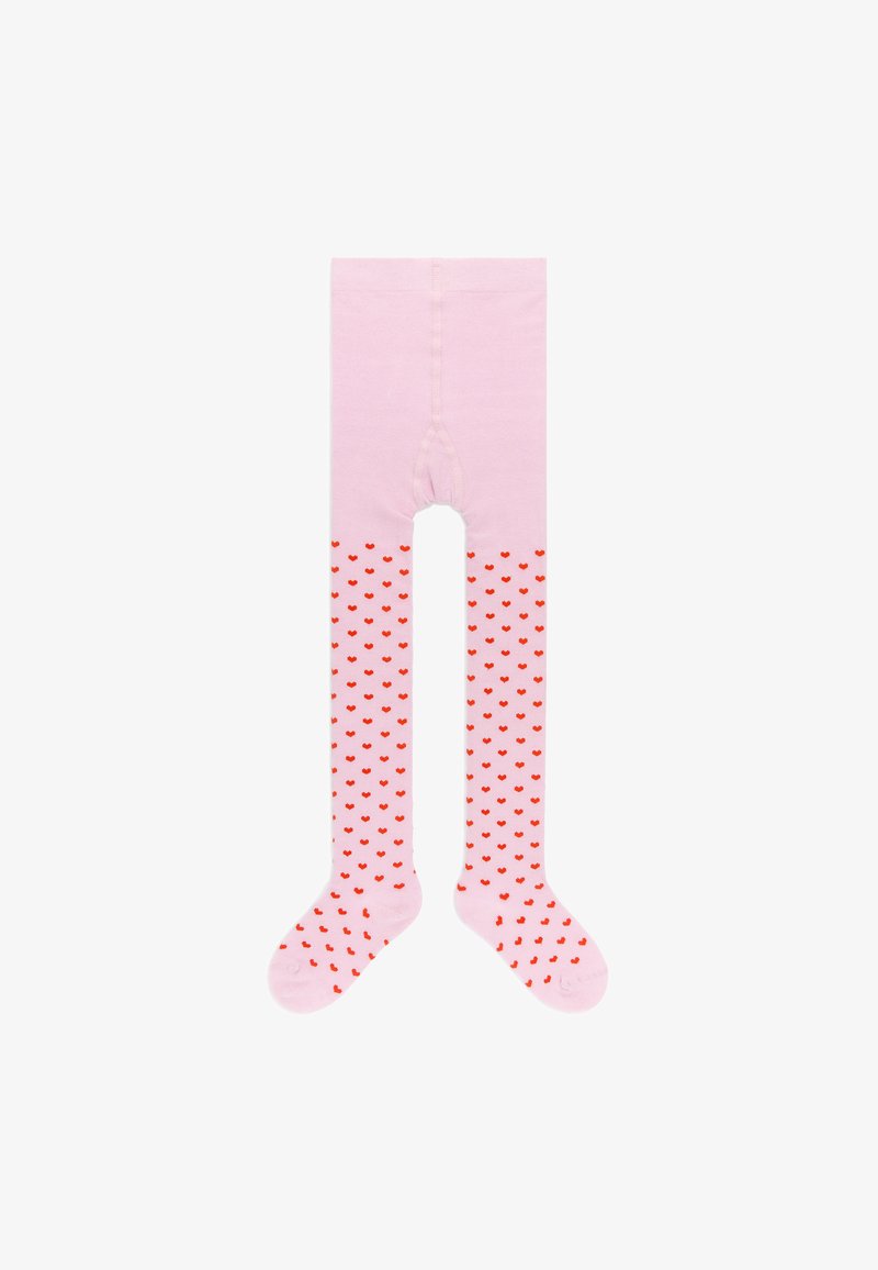 Collants rose clair pour enfants avec des motifs de cœurs rouges couvrant les jambes et les pieds sur fond blanc.