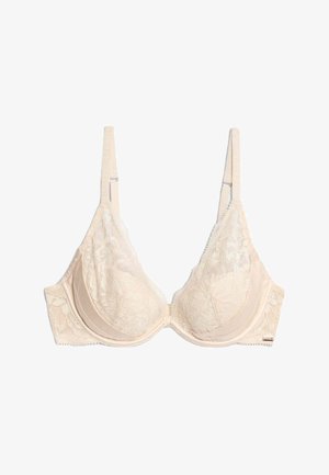 Reggiseno con ferretto in pizzo crema, con spalline regolabili e motivo floreale sulle coppe e ai lati, esposto piatto su uno sfondo bianco.