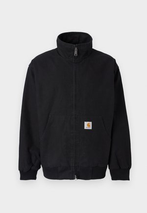 Μαύρο μπουφάν με φερμουάρ και ψηλό γιακά, με ριμπ μανσέτες και τελείωμα, διαθέτει μπροστινή τσέπη και ένα μικρό λογότυπο στη αριστερή πλευρά.