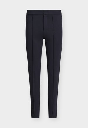 Pantaloni sartoriali blu navy realizzati in tessuto liscio, caratterizzati da una silhouette aderente, pieghe frontali e chiusura con zip nascosta e bottone.