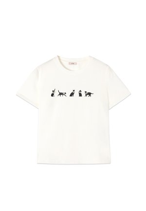 T-shirt blanc en coton à col rond avec un imprimé de six illustrations de chats noirs sur la poitrine. Manches courtes, coupe décontractée.