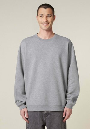 Grijze sweatshirt van een katoenmix, met een ronde hals, verlaagde schouders en geribbelde manchetten. Lose fit met een gladde textuur.