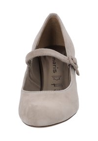 Beige mockasinfärgad Mary Jane-sko med rund tå, sidrem och spänne. Mjuk textur och slät finish på det övre materialet.
