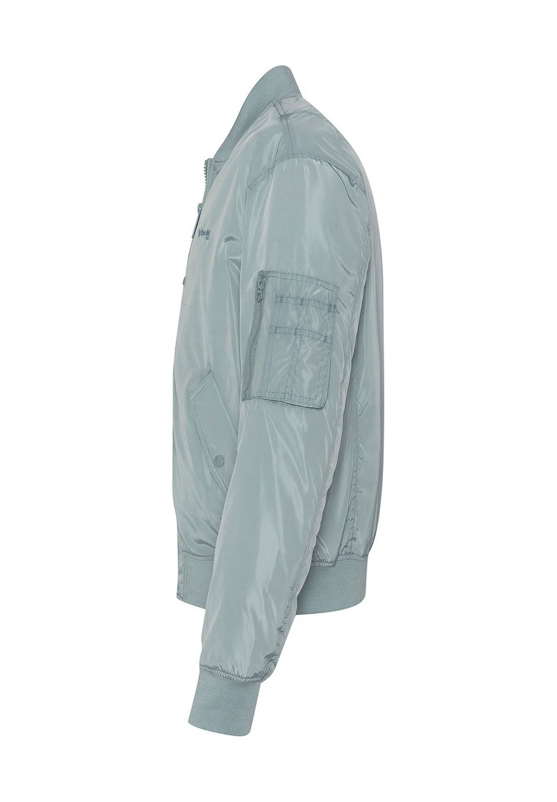 Chaqueta bomber azul claro de nylon brillante. Cuenta con puños y cuello acanalados, un bolsillo con cremallera en la manga izquierda y un bolsillo lateral.
