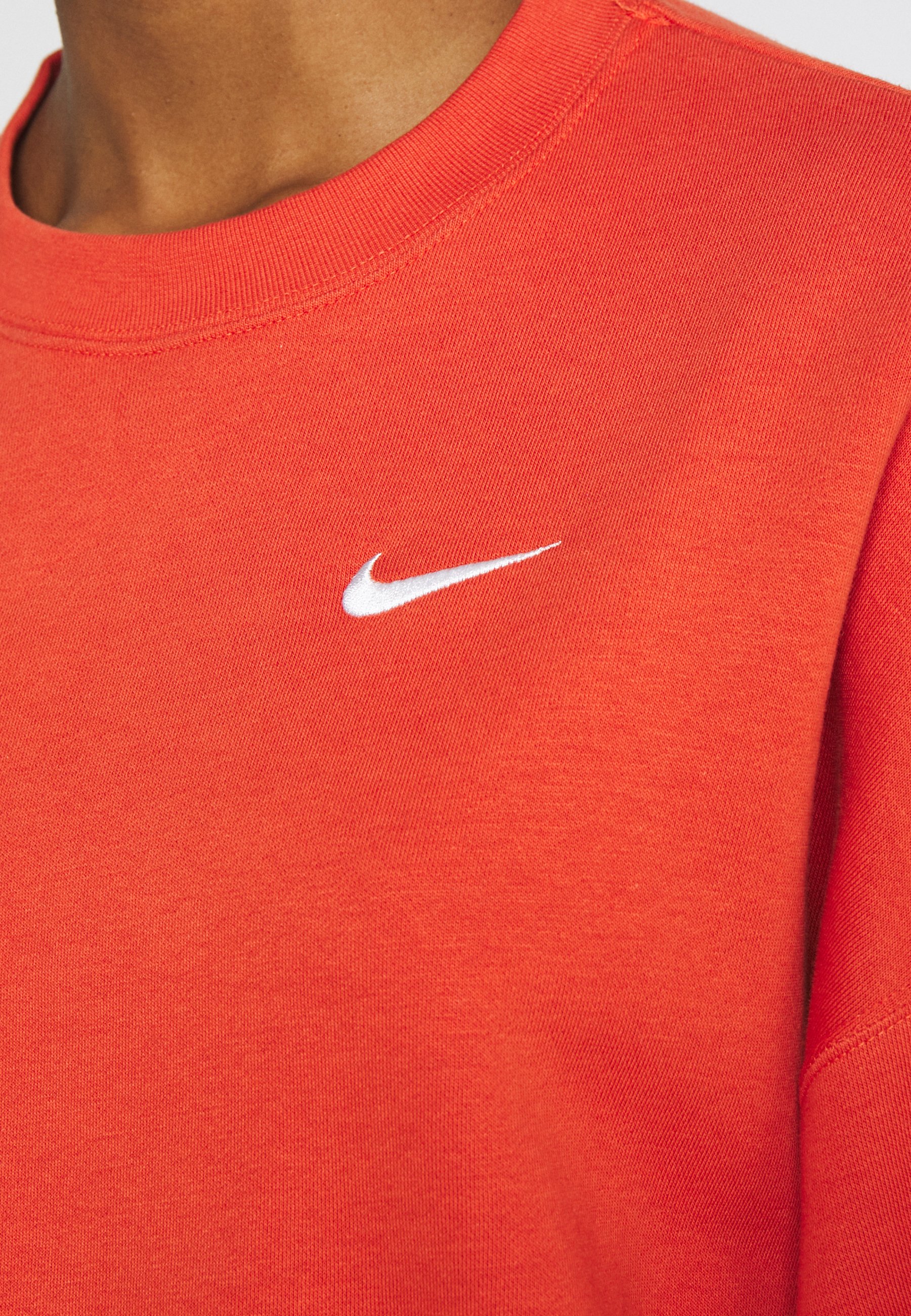 orange nike crew neck